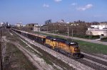 CSX 6209 with a Unit Grain train made up of 100 Ton 3 bay hoppers with "Hopper Toppers'